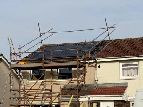 Solar panels installation progress on house Stock Photos