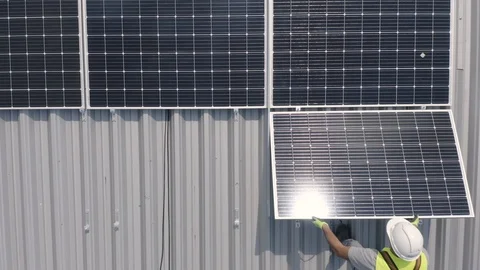 Solar Panels Installation on Rooftop from Above D-Log Video stock 117851748