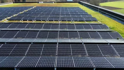 Solar panels installed on a high-rise building Video stock 244806629