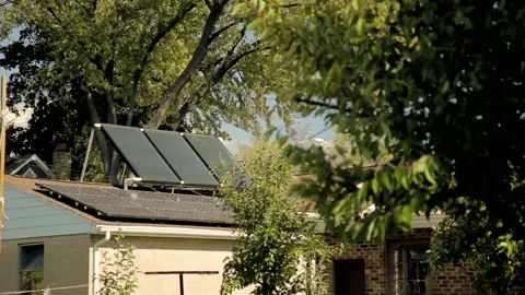 Solar Panels Installed on a House Stockbeeldmateriaal 134588925