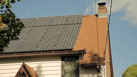 Solar Panels Installed on a House Stockbeeldmateriaal 134588996