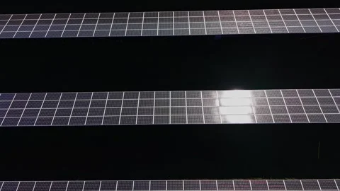 Solar panels installed on a large structure under clear skies in daylight 動画素材 334028651