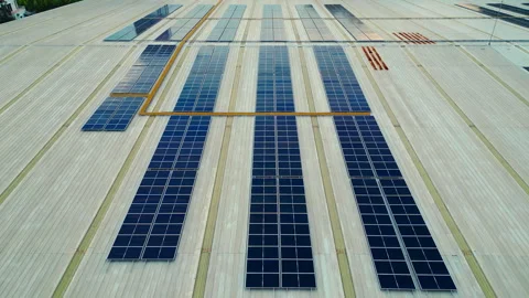 Solar Panels Installed on a Large Warehouse Rooftop in a Modern Industrial Area Stock Footage 304243182