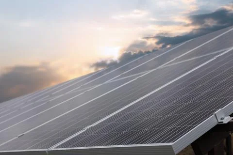 Solar panels installed outdoors. Alternative energy source Stock Photos