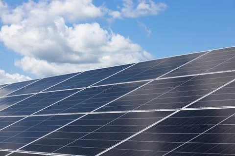 Solar panels installed on a rooftop generating clean sustainable energy Stock Photos