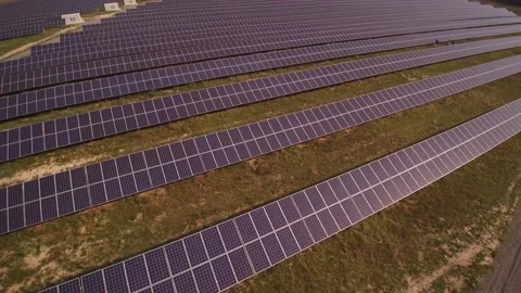 Solar panels installed in rows produce clean electric energy Stock Footage 169855606