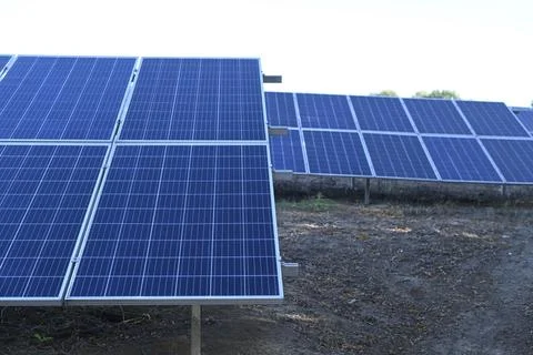 Solar panels installed in rows at a solar power station, Stock Photos