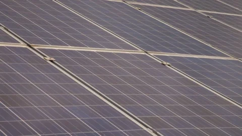 Solar panels installed in a rural area. Solar power plant in a field. Stock Footage 258120070