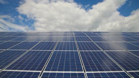 Solar panels installed in a rural area. Solar power plant in a field. 스톡 동영상 258120089