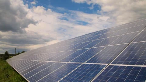 Solar panels installed in a rural area. Solar power plant in a field. Stock Footage 258120093