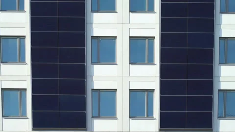 Solar Panels installed on the wall of new building Stock Footage 127592898