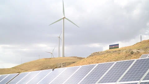 Solar panels. Large rotating propellers generating wind power Stock Footage 232916923