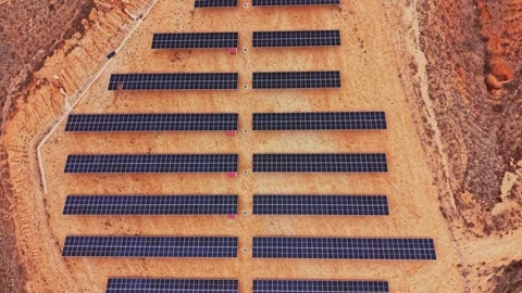 Solar panels lay in rows at a site in Spain for renewable energy generation Stock Footage 333113066