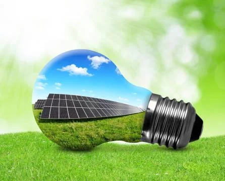 Solar panels in light bulb Foto stock