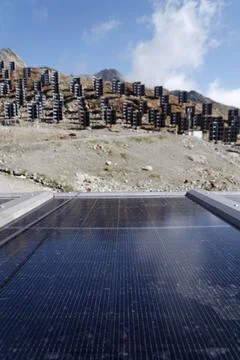 Solar panels lying on ground with vertically mounted four wings around cent.. 写真素材