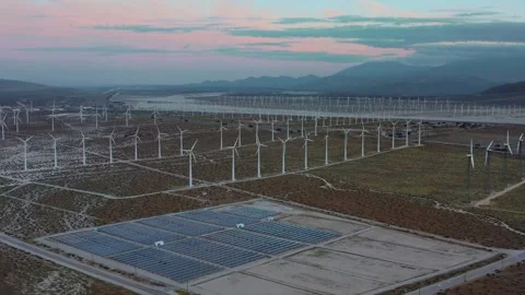 Solar Panels Next To A Wind Farm, Concept Of Renewable Energy, Environmental Stock Footage 347746344