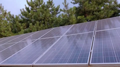 Solar panels as a renewable energy source, reducing dependence on fossil fuels a Stock Footage 300250497