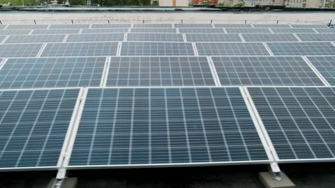 Solar panels on the roof of a multi-storey building after rain. Stock Footage