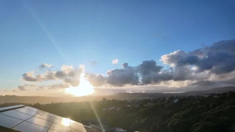 Solar panels on rooftop during a picturesque sunrise Stock Footage 330026401