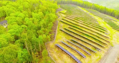 Solar panels solar farm utility country Stock Footage 236417853
