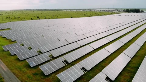  Solar Panels Stands in a Row in Field for Power Production. Stock Footage 162127075