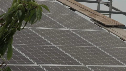 Solar panels at substation cells installed onto supports Vidéo 164686670