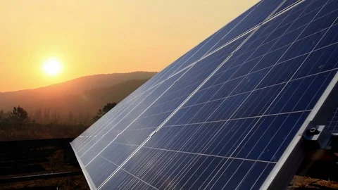 Solar panels with sunrise timelapse 動画素材 80767896
