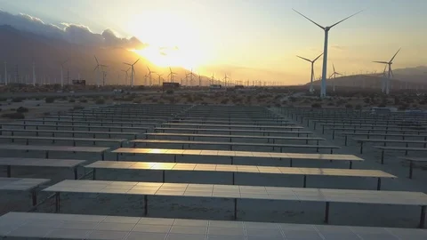 Solar Panels at Sunset and Wind Farm Alternative Energy Choices Stock-Footage 96249857