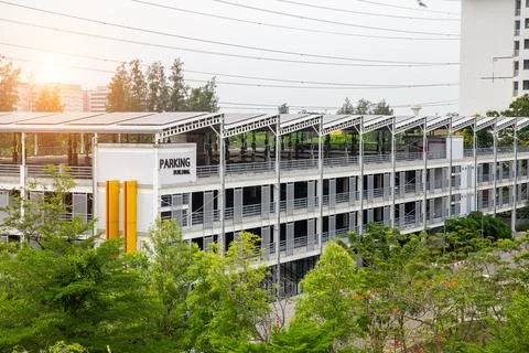 Solar panels system lined up in a parking building to store solar electricity Stock Photos