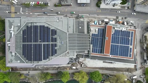Solar panels on two rooftops top view renewable energy concept 库存影片 332706468