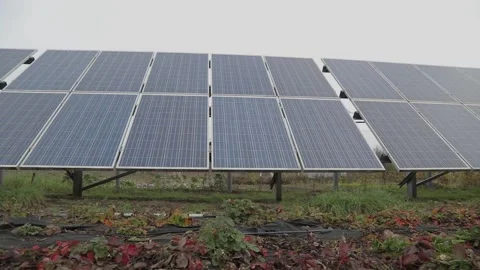 Solar panels under a gray sky Stock Footage 144124547