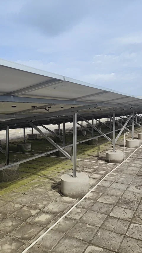 Solar panels at vertical composition in a day time Stock Footage 309978213