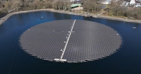 Solar panels on water, circular shape. Renewable energy. Energy transistion. Stock Footage 305433675
