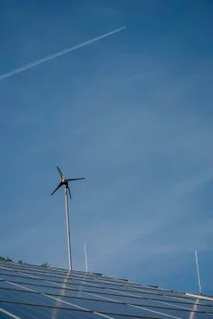Solar panels with wind generator close-up Stock Photos