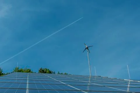Solar panels with wind generator Stock Photos