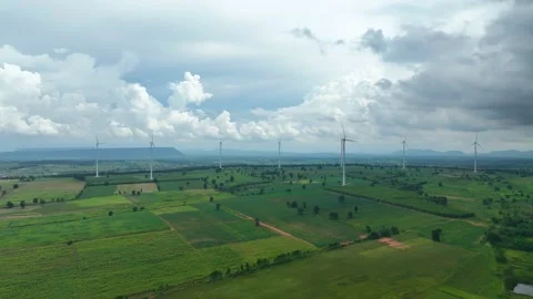 Solar panels with wind turbines generating electricity - Alternative renewable  Stock Footage 232126025