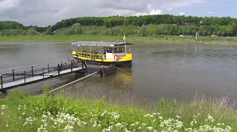 Solar power driven passenger ferry arrives at the south bank of  the river Rhine Stock Footage 41771996