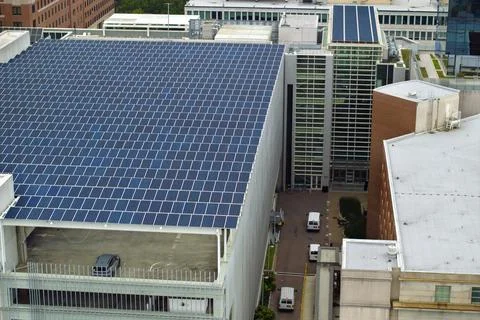 Solar power generation technology integrated in urban infrastructure. Photovo Stock Photos