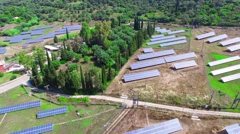 Solar power panels ECO sun farm countryside. Alternative energy 4k aerial video Stock Footage 66570485