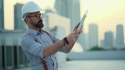Solar power plant engineer Calculate and find the direction of sunlight to in Stock Footage 155216875