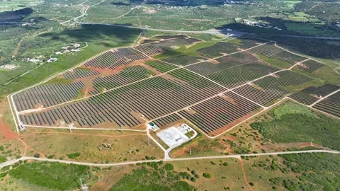 Solar power plant installation with extensive photovoltaic panel array observed Stock Footage 337443559