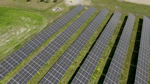 Solar Power Station Panels In The Fields Video stock 243630138