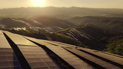 Solar power station panels in a row in the fields green energy Stock Footage 342169101