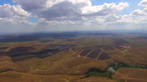 Solar Power Stations Among Multi Colored Agricultural Fields Video stock 54754475
