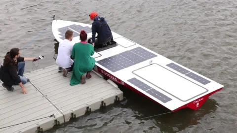 Solar-powered   boat constructed by students on Vistula river. Stock Footage 154899130