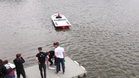 Solar-powered   boat constructed by students on Vistula river. Stock Footage 154899168