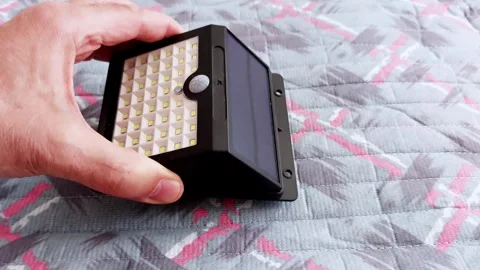 Solar-Powered LED Light: Motion Sensor in Action Stock Footage 310773029