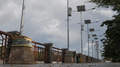 Solar powered LED lights in the city park's sidewalk Video stock 106571388