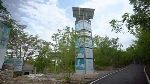 Solar-Powered Water Tower with SPAN Pumps Signage, Piplantri Village, Rajasthan Stock Footage 313238811