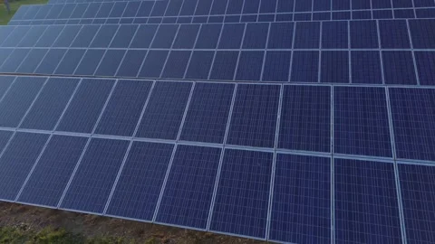 Solar Symphony: Captivating Drone Flight Reveals the Majestic Power of Clean Ene Stock Footage 244170205